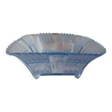 Polished transparent blue glass fruit bowl