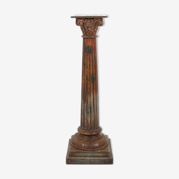 Old wooden corinthian column