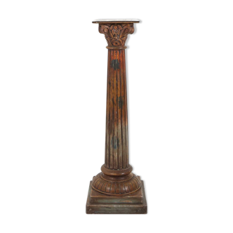 Old wooden corinthian column