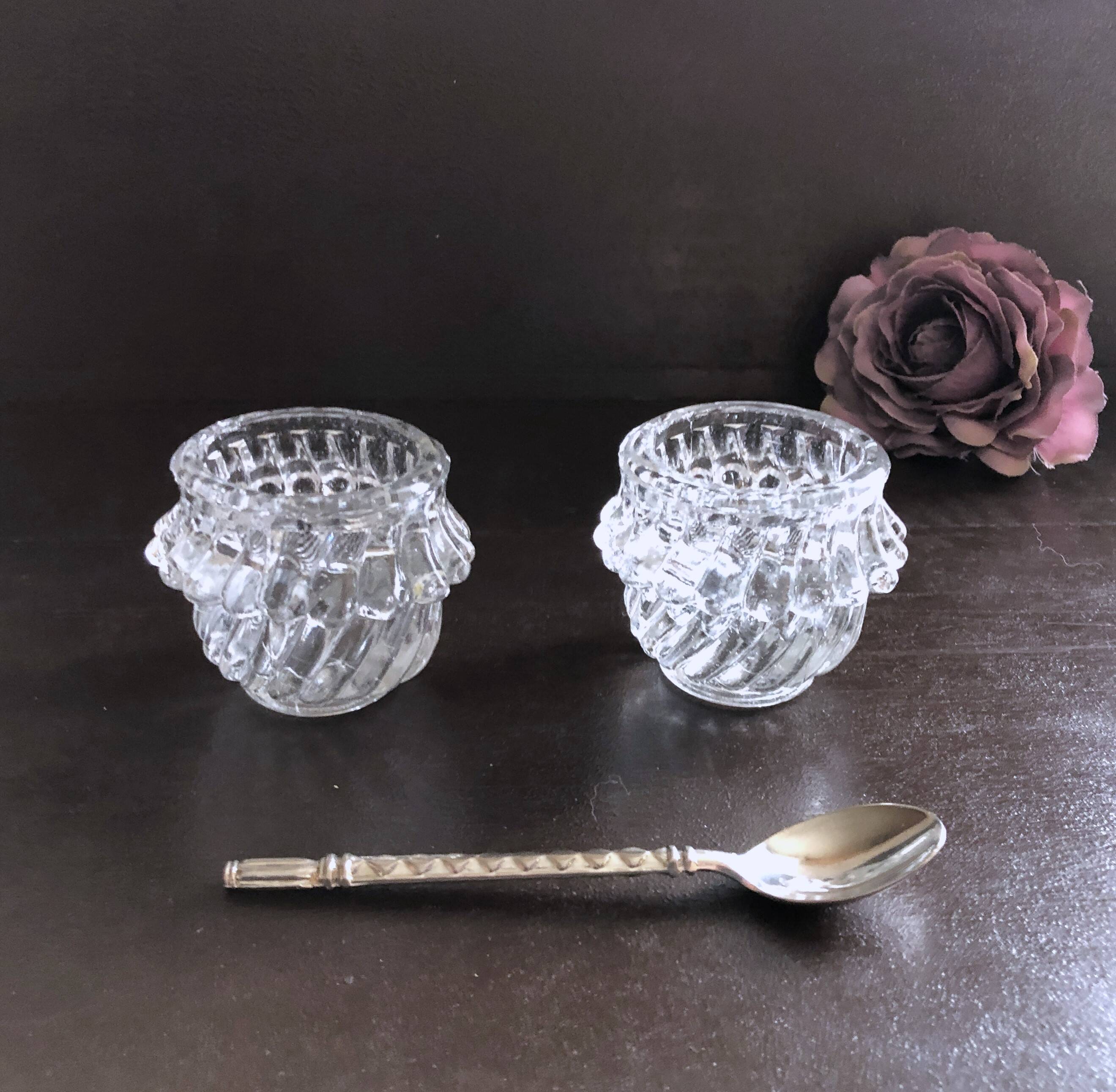 Glass salt and pepper shaker set with vintage serving spoon