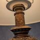 Vintage lamp with bronze imitation base & green relief glass in an antique style.