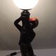 Vintage 1970s statue lamp – Black figurine in Art Deco style, opal ball.