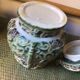 Stoneware pot with Asian decoration