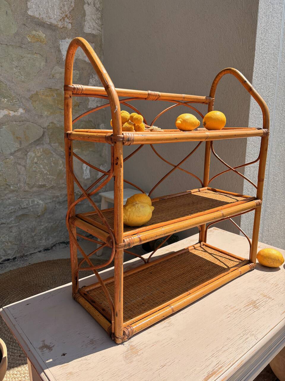 Vintage wall shelf in rattan