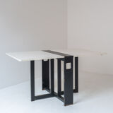 Extendable dining table with architectural base, Belgium 1960s. This folding table features two exte