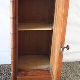 Pitchpin and bamboo beside table 1900