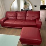 Red leather sofa with ottoman