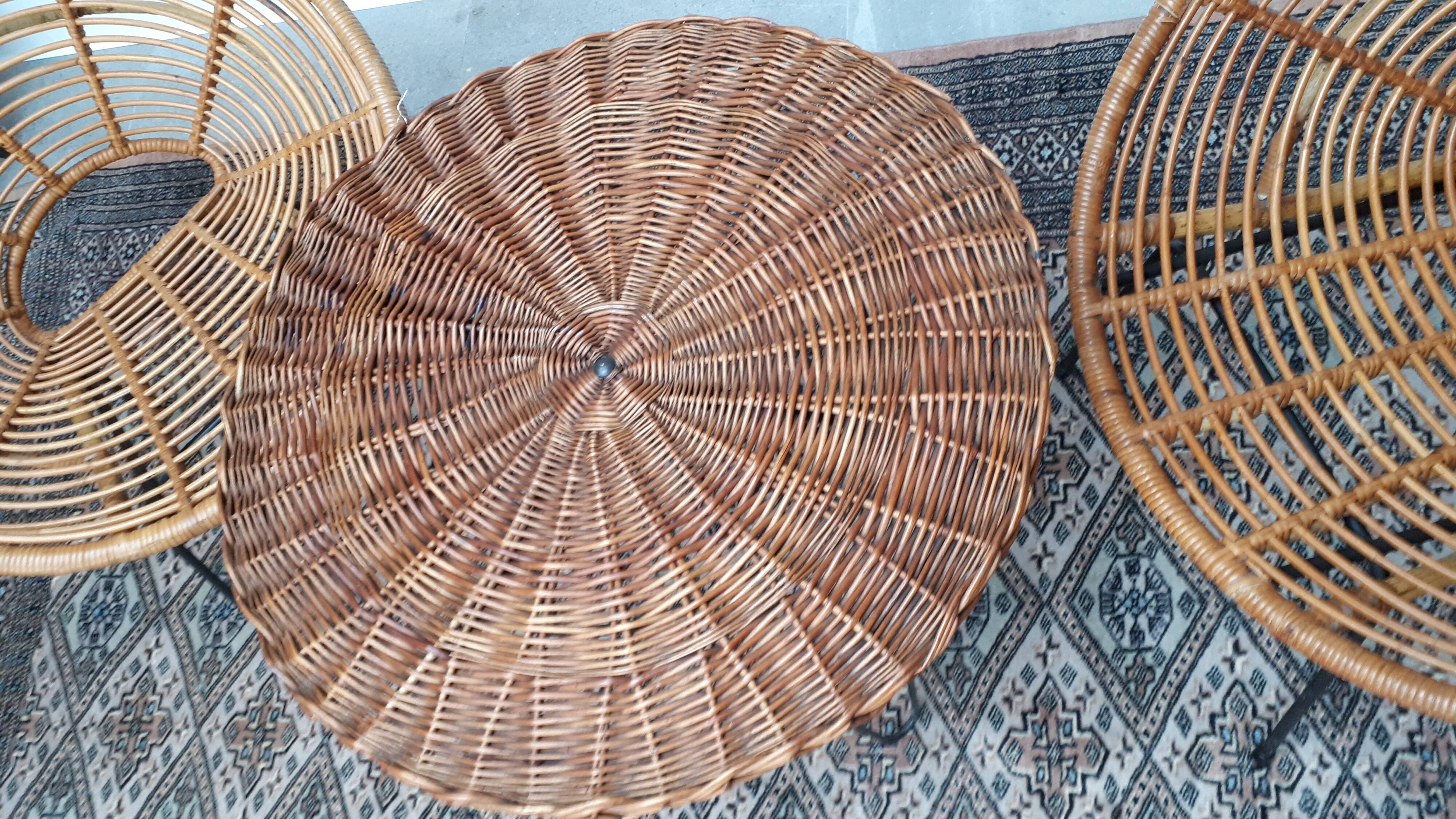 Set of armchairs "soleil" and rattan table of the years 50