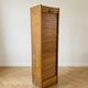 Antique oak filing cabinet with curtains