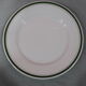 3 plates in white porcelain and green edging