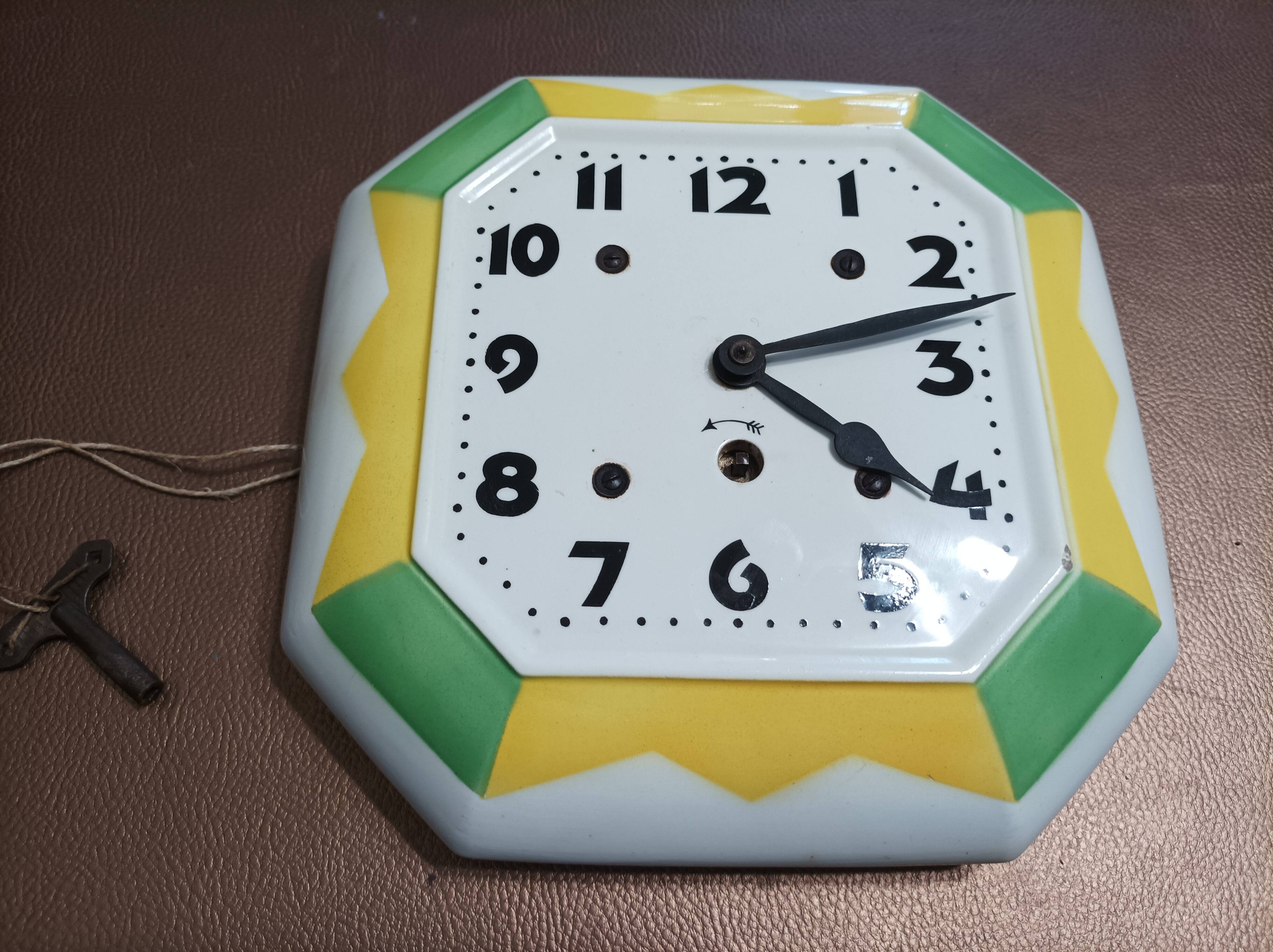 White ceramic wall clock from the 50s/60s