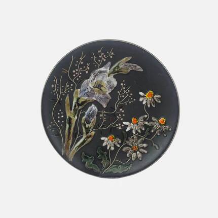Black ceramic plate with wildflower design, Ruscha Art Pottery, Germany.