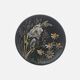 Black ceramic plate with wildflower design, Ruscha Art Pottery, Germany.