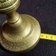 Former pair of bronze candlesticks