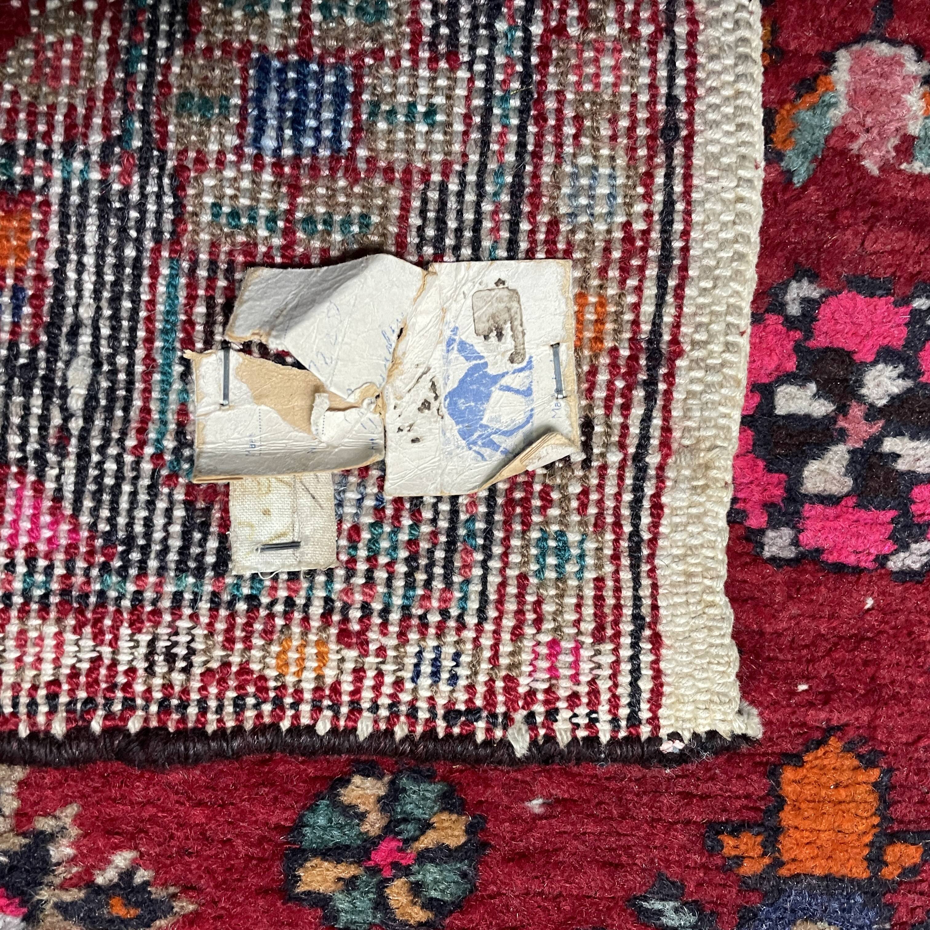 Worn vintage oriental rug or carpet