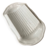 Plain white porcelain asparagus dish
