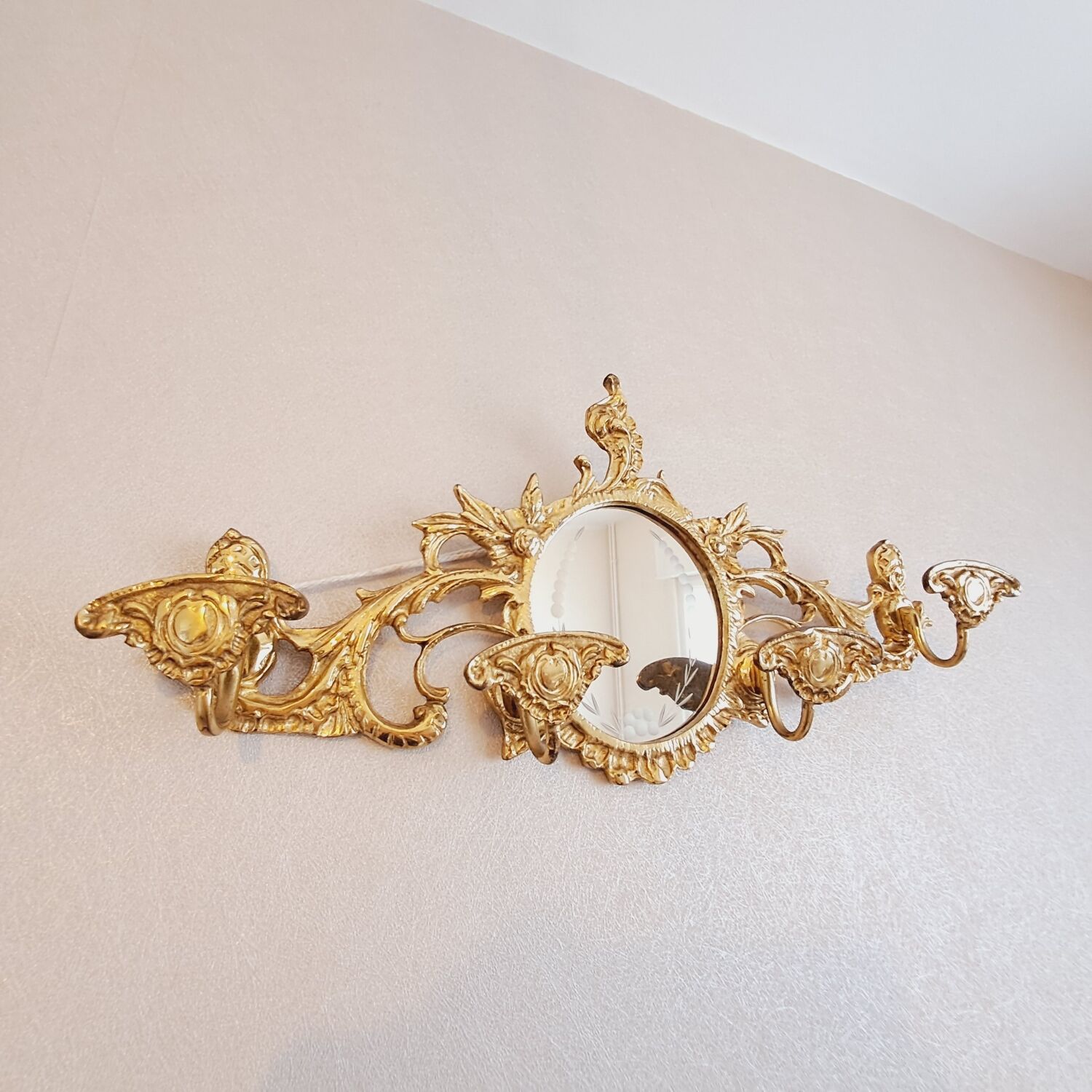 Bronze wall coat rack with chiseled mirror