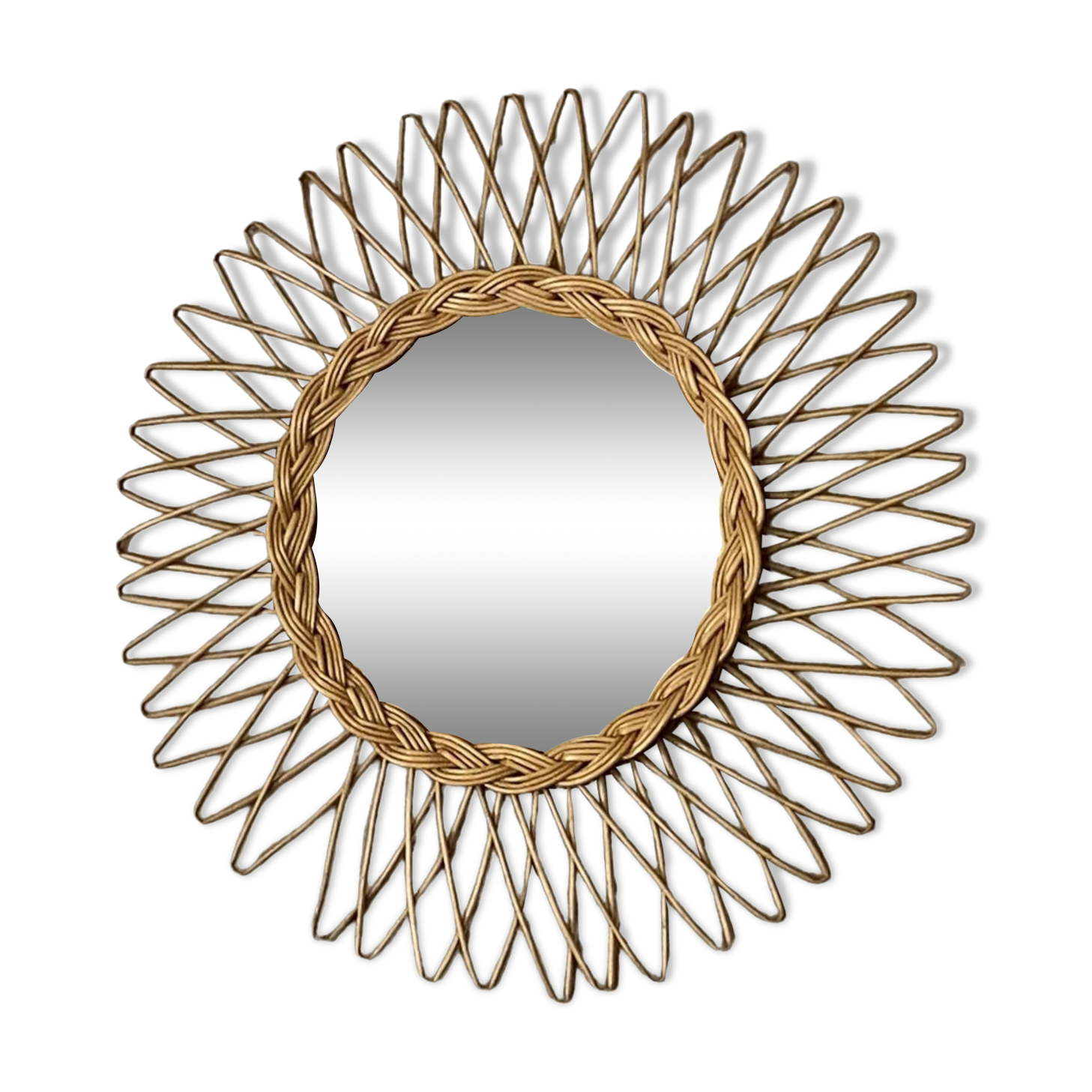 Sun mirror in woven rattan. 50cm. 1960.