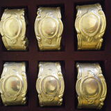 Six rounds of brass towel in their original box 1960  Art Deco