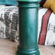 Pedestal column in green ceramic with flower and fruit decoration
