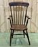 English armchair in elm from the late 19th century.