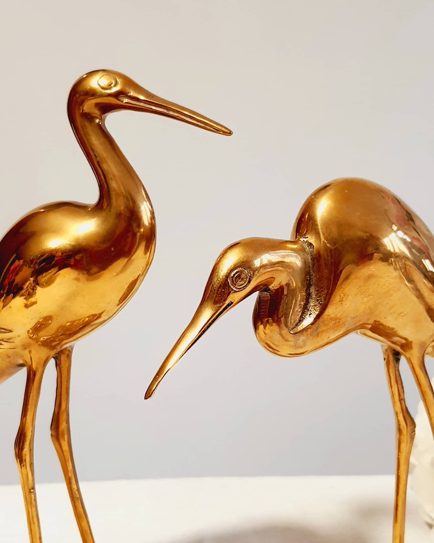 Couple of heron in vintage golden brass