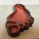 Red ceramic footprint catchall.