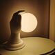 Hand-shaped ceramic wall lamp with 80s glass sphere
