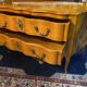 Grande commode sauteuse à façade arbalète merisier blond ornement bronze so