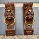 Pair of consoles, corbels, wooden and brass lion supports, 19th century.