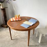 Scandinavian round teak table with extension