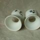 Diabolo porcelain egg cup with barbell decoration