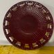Burgundy and gold openwork plate in ceramic from Saint-Clement, 1950s.