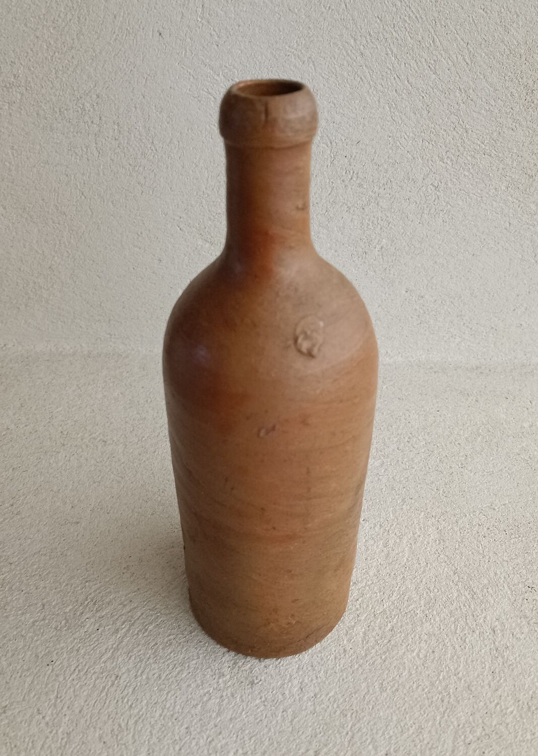 Antique terracotta bottle