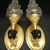 Pair of torchiere wall lights with hands - gilded bronze and black patina