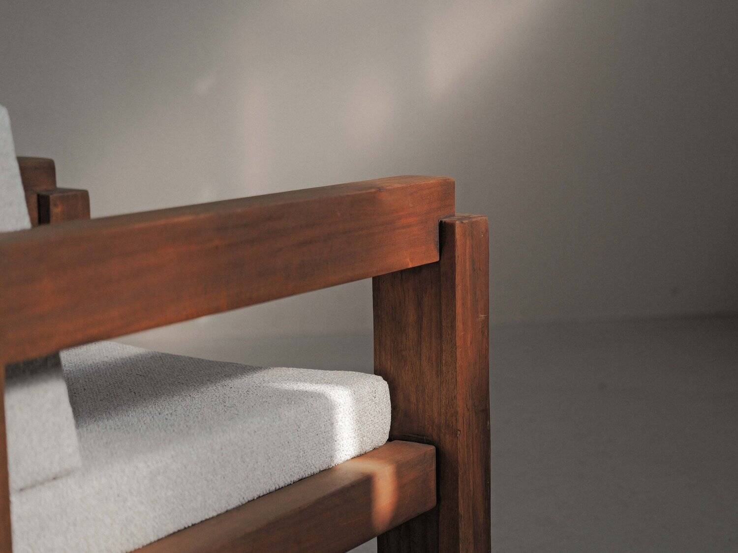 Handcrafted armchair in solid wood and fabric, 1980s-90s.