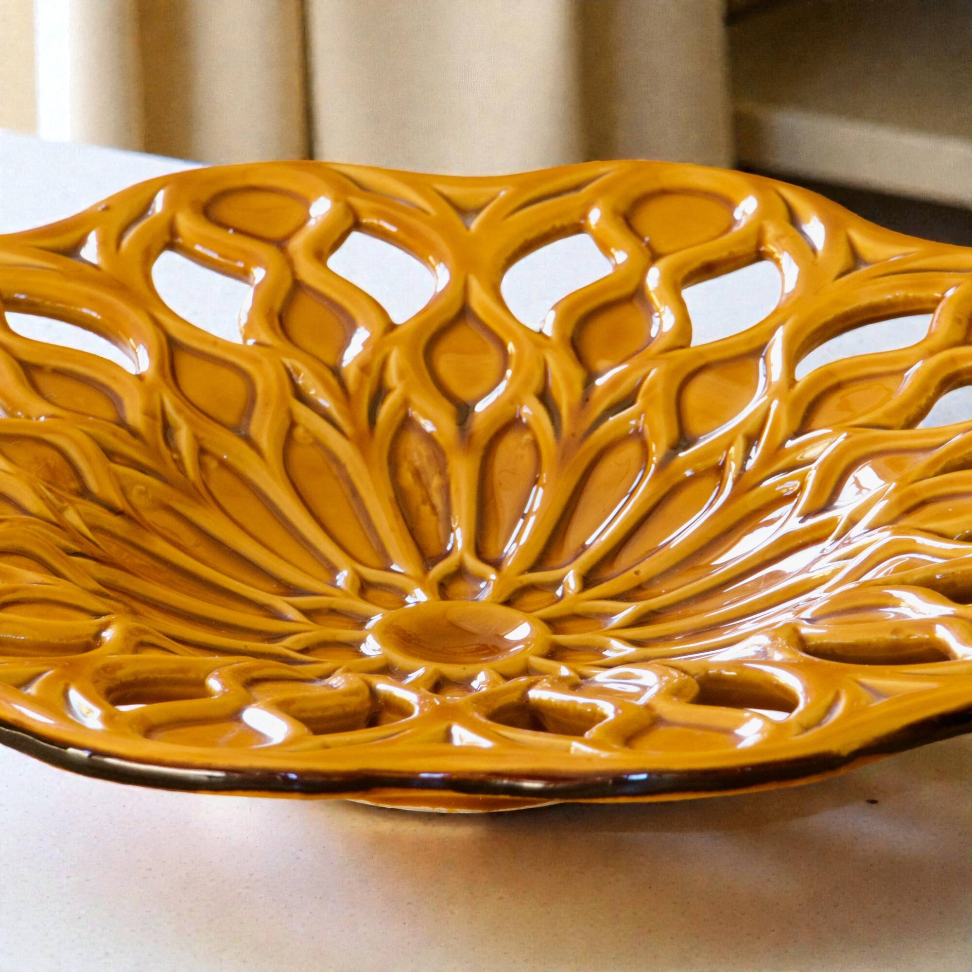 Large openwork majolica fruit bowl in earthenware.