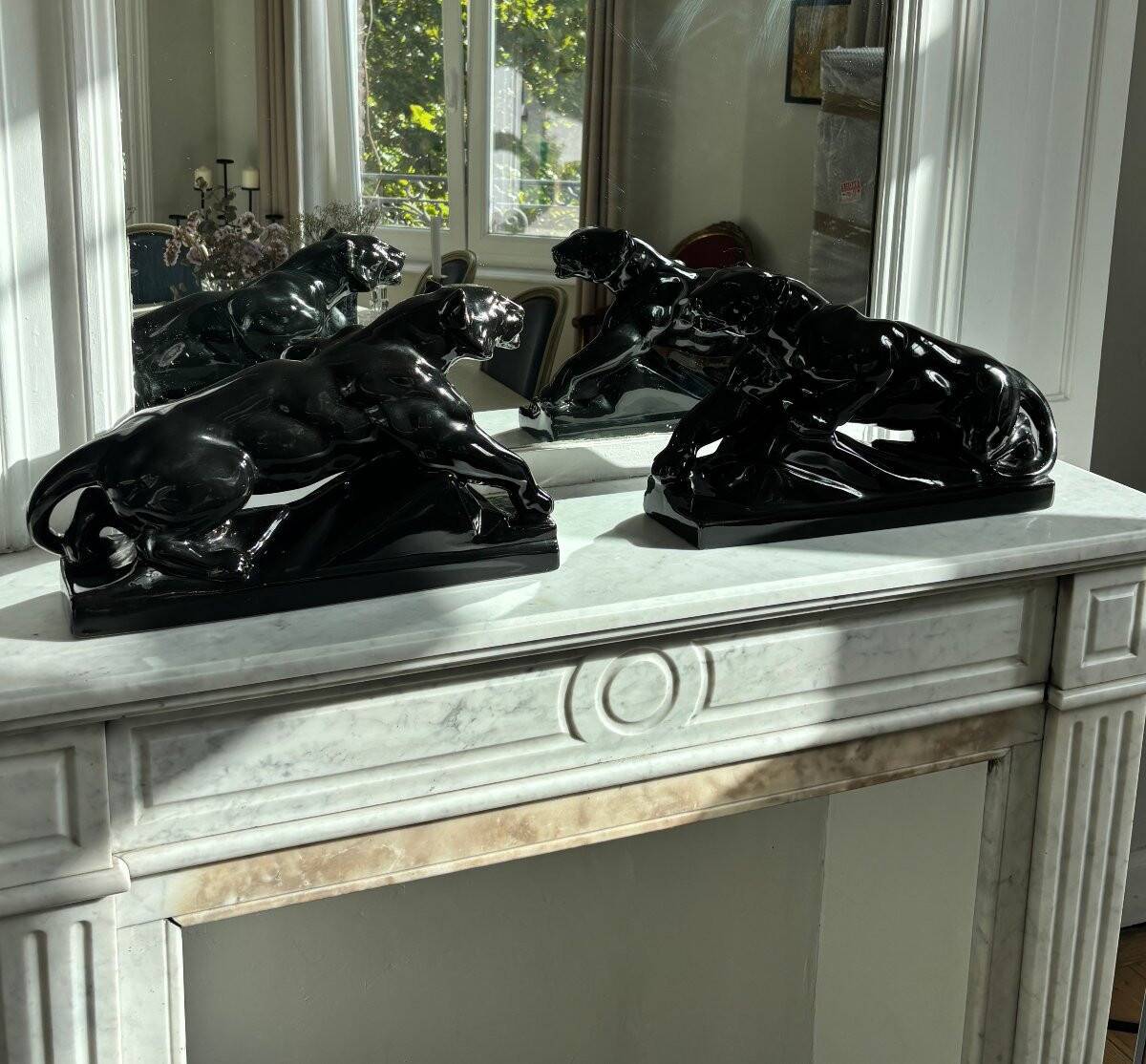 Pair of Art Deco lioness sculptures