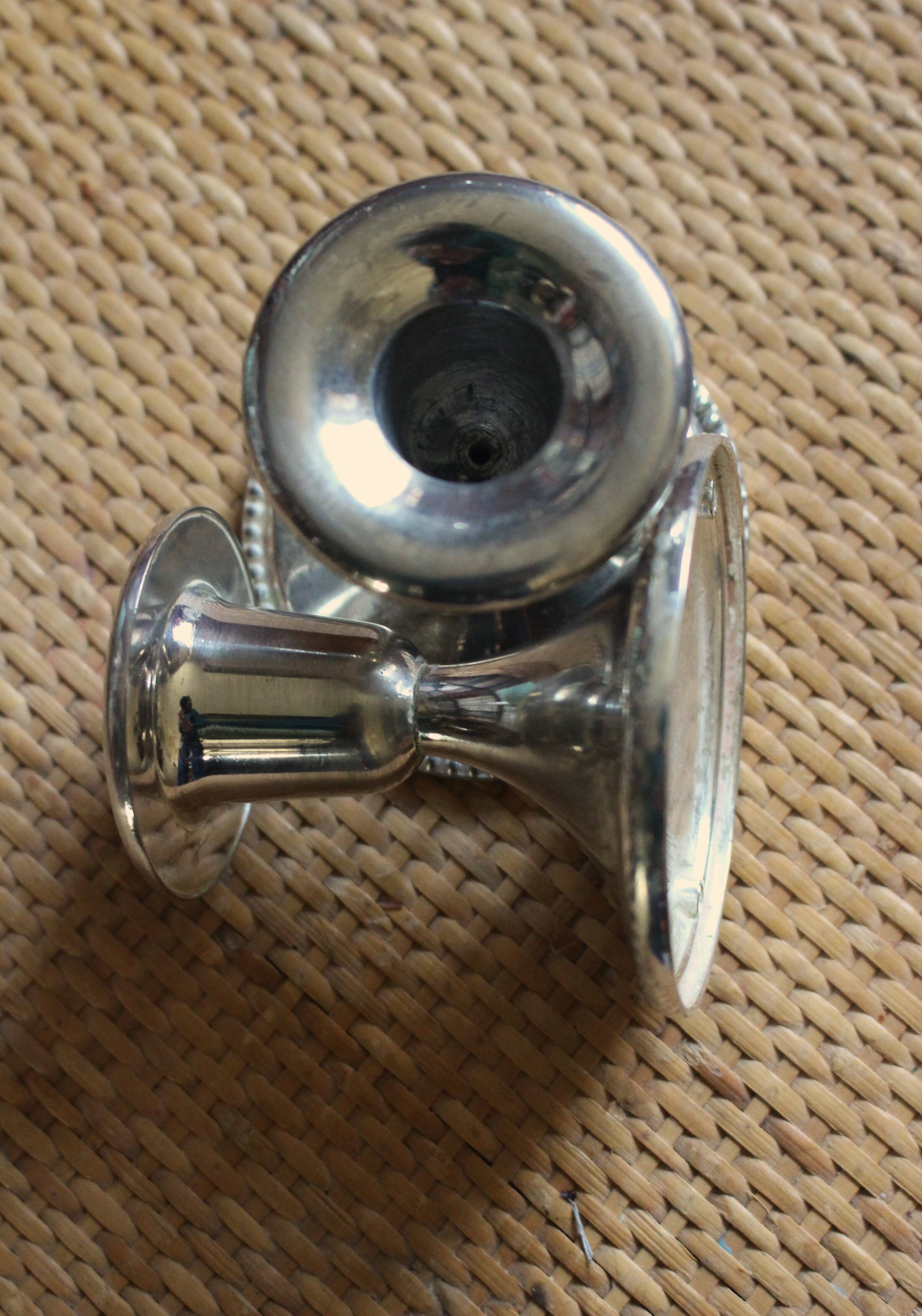 Pair of chrome metal candlesticks