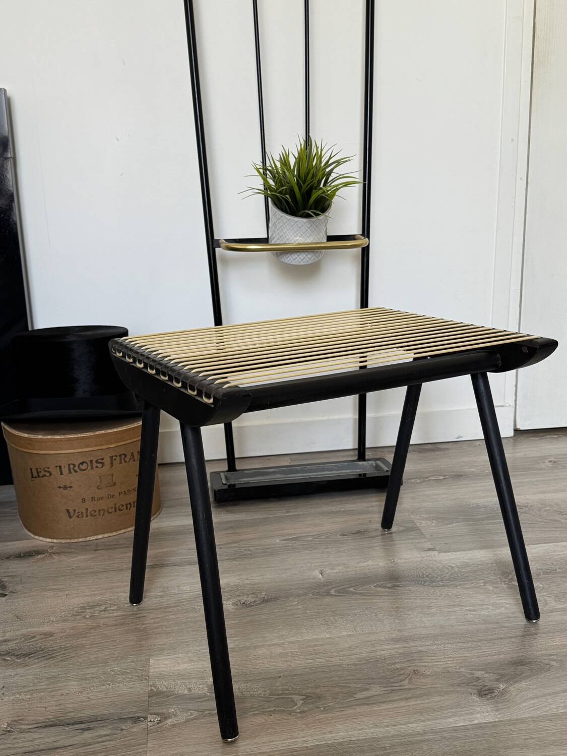 Vintage black Georges Tigien stool