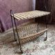 Rattan magazine rack, vintage from the 1960s.