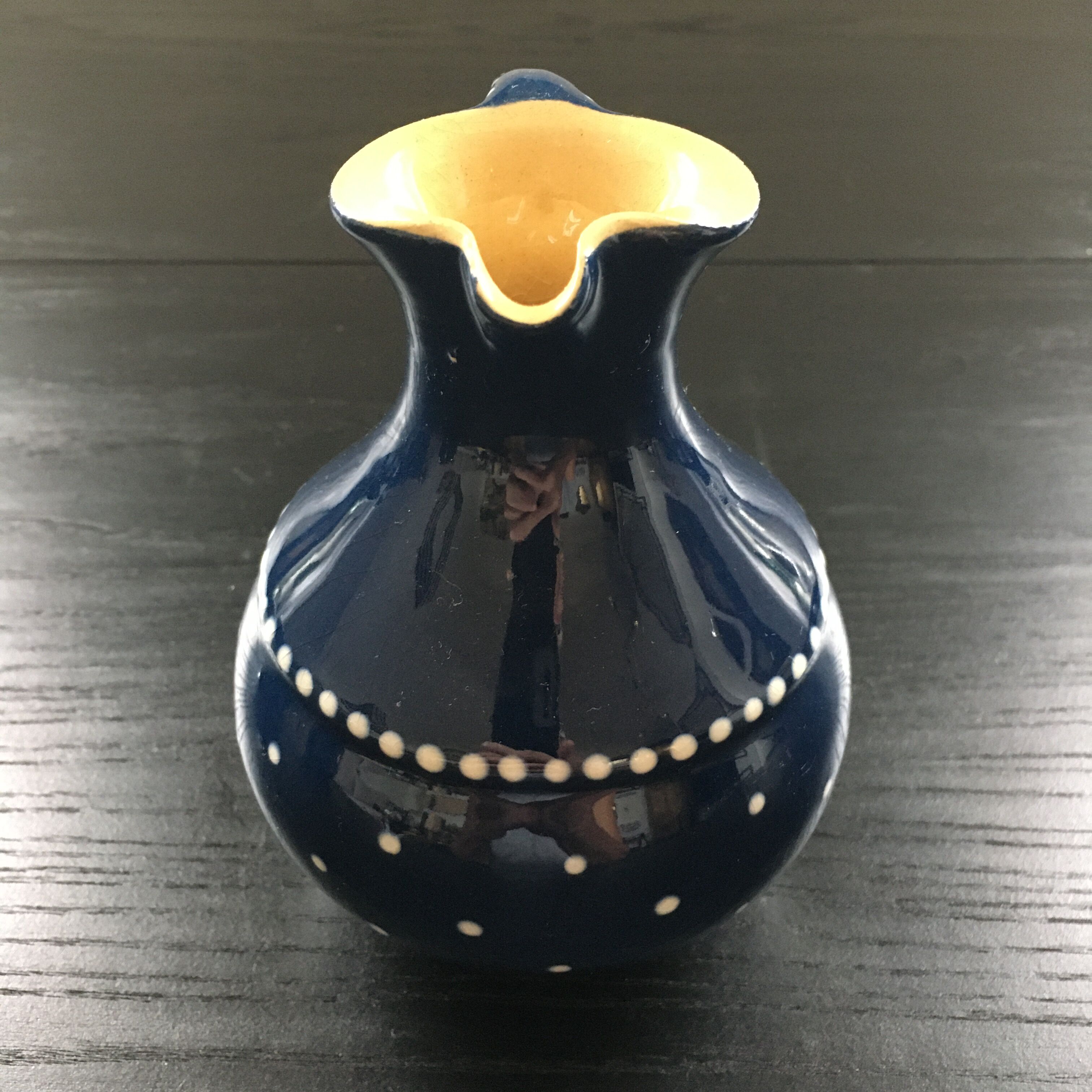 Midnight blue pitcher décor white polka dots