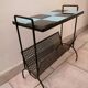 Table carries steel magazines perforated sheet metal vintage ceramic checkerboard