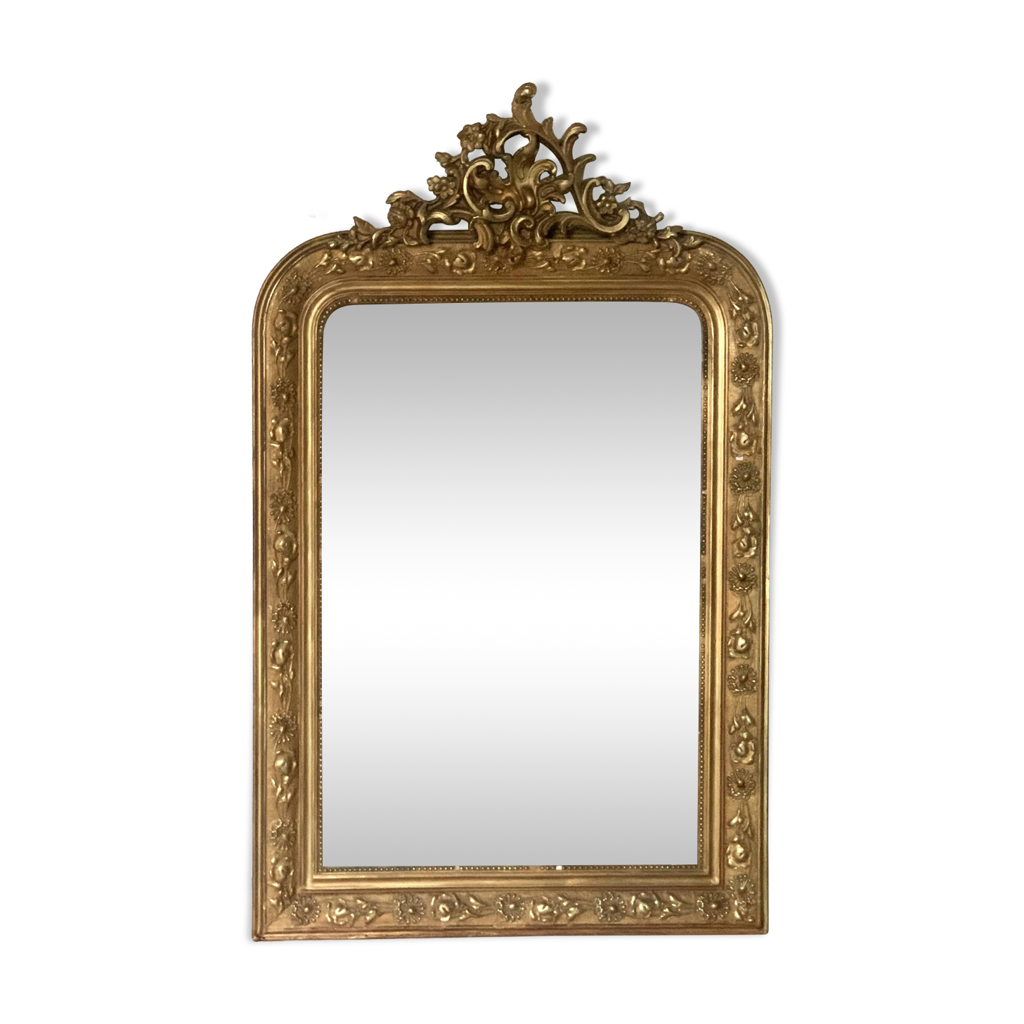 Golden fireplace mirror with pediment