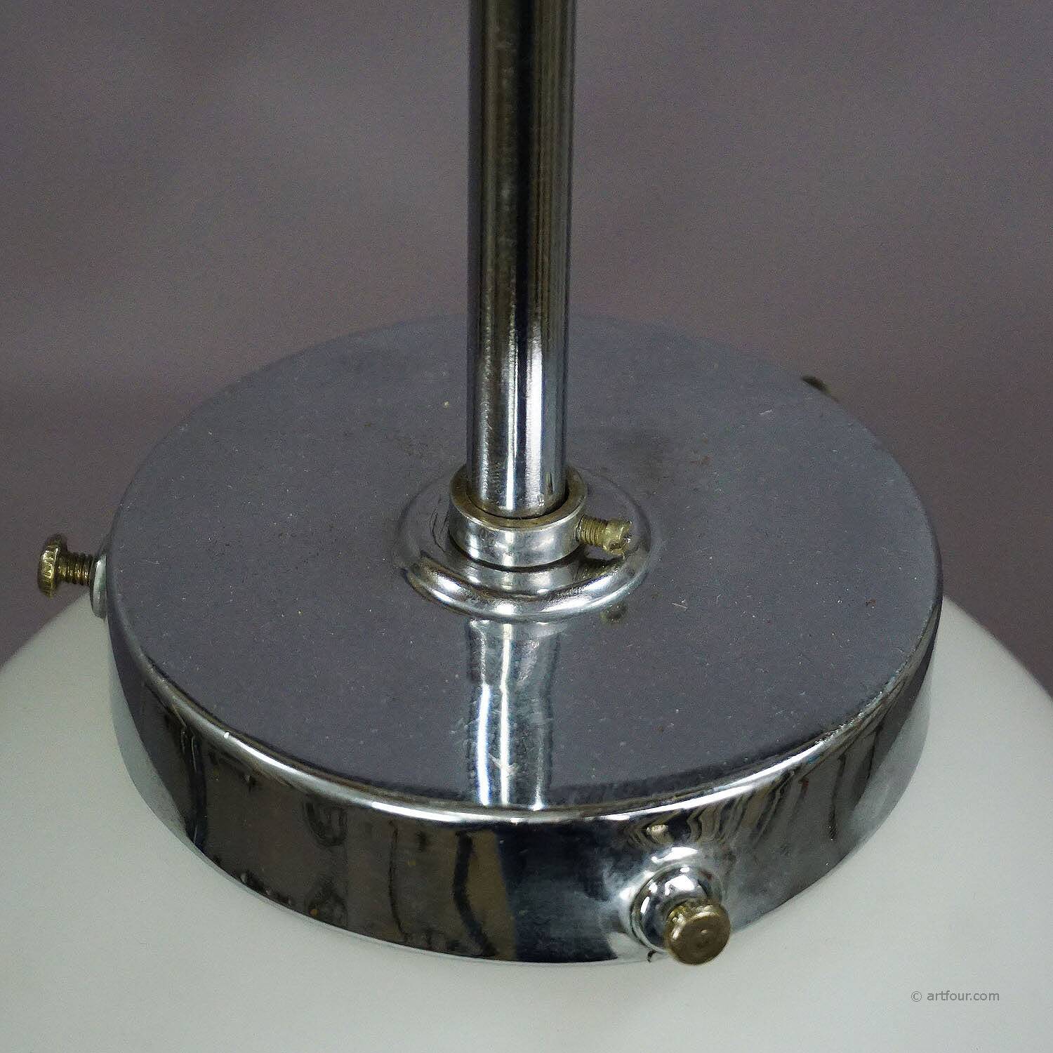 Functionalist suspension in Bauhaus style with opaline glass shade.