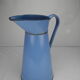 Old vintage enamelled sheet metal jug