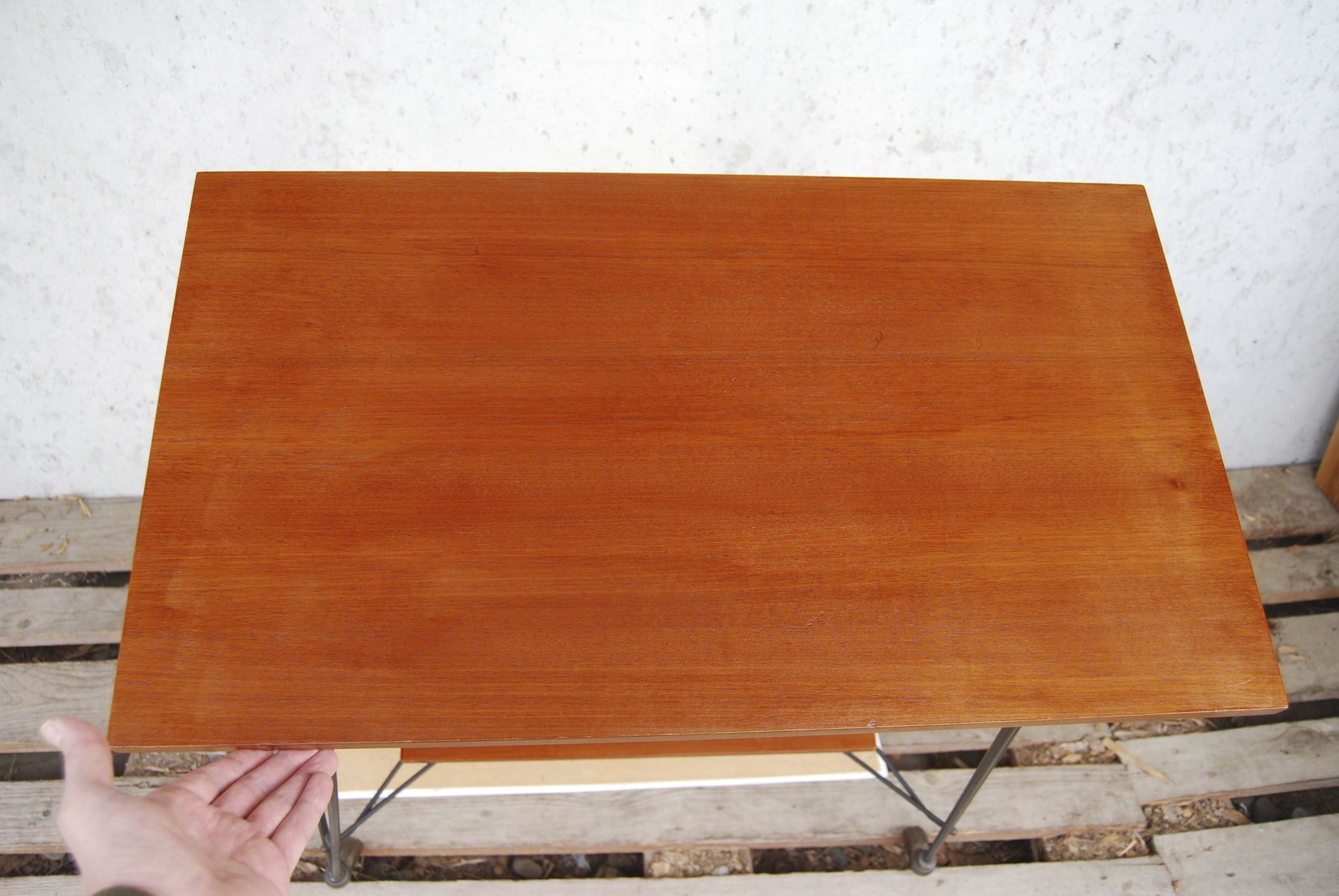 Tv furniture, a table with teak wheels and Scandinavian-style metal.