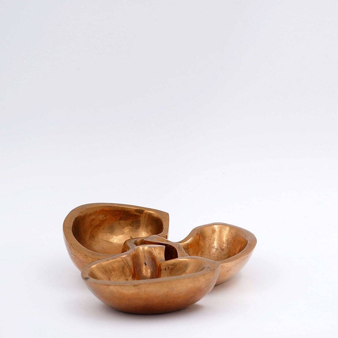 Empty Pockets in polished bronze Margrit van Nuffel 1970, set of 3