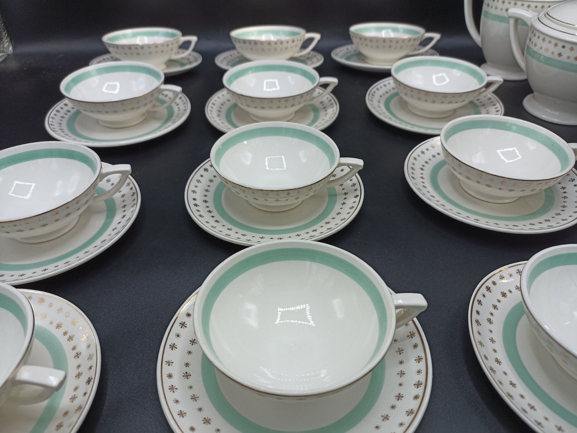 Tea set stars and mint green in semi-porcelain