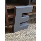 E metal letter